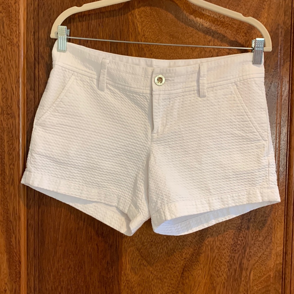 Lilly Pulitzer solid white Callahan 4” shorts.